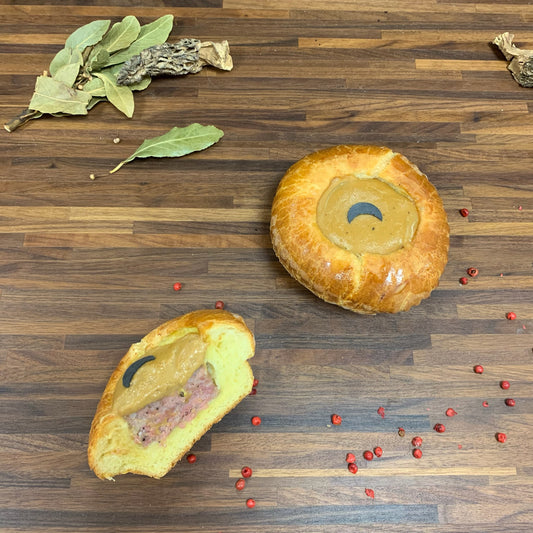 Bouchée de Cervelas Truffé 3% Sauce Champagne